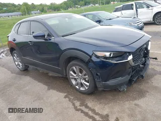 2021 Mazda CX-30 Select z VIN 3MVDMABL8MM209992, wystawiony jako IAAI lot #42171609 z przebiegiem 133 707 mil mil oraz . Historia ofert i sprzedaży dostępna na DreamBid. Obrazek 1.