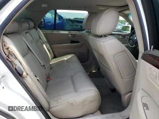 2009 Cadillac DTS 1SC z VIN 1G6KD57Y99U141826, wystawiony jako Copart lot #56242094 z przebiegiem 107 960 mil mil oraz Szkoda całkowita • Salvage title. Historia ofert i sprzedaży dostępna na DreamBid. Obrazek 10.
