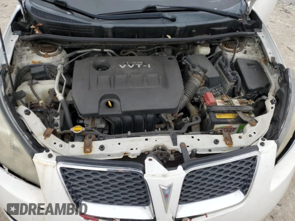 2009 Pontiac Vibe 1SA z VIN 5Y2SP67809Z409952, wystawiony jako Copart lot #52494555 z przebiegiem 127 824 mil mil oraz Czysty tytuł • Clean title. Historia ofert i sprzedaży dostępna na DreamBid. Obrazek 13.
