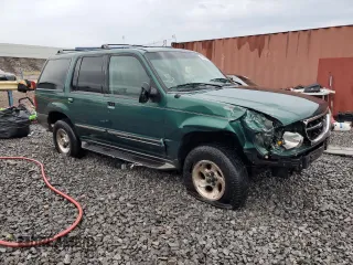 2000 Ford Explorer with VIN 1FMZU63X2YUA56061, listed as a Copart auction lot 45004465 with 117,860 mi miles and Salvage title. Bid and sale history available at DreamBid. Image 4.