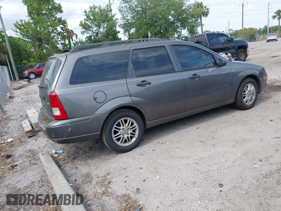 2005 Ford Focus SE with VIN 1FAFP36N35W211505, listed as a IAAI auction lot 42087016 with 256,413 mi miles and . Bid and sale history available at carsss.com. Image 4.
