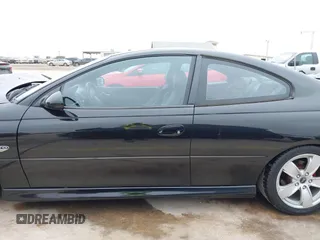2006 Pontiac GTO with VIN 6G2VX12U46L827831, listed as a IAAI auction lot 41319936 with 102,173 mi miles. Bid and sale history available at carsss.com. Image 14.