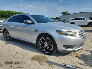 2014 Ford Taurus Limited with VIN 1FAHP2F89EG165301, listed as a Copart auction lot 63856455 with 160,439 mi miles and Clean title. Bid and sale history available at DreamBid. Image 4.