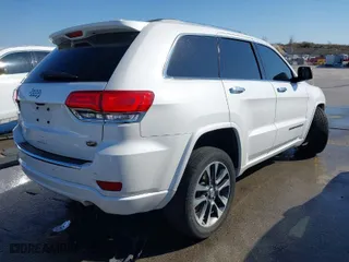 2017 Jeep Grand Cherokee Overland with VIN 1C4RJECGXHC636297, listed as a IAAI auction lot 41661922 with 111,477 mi miles. Bid and sale history available at carsss.com. Image 4.