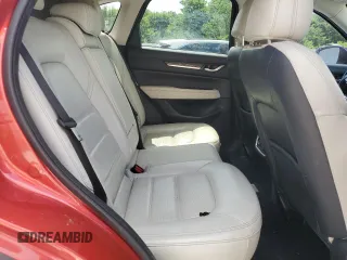 2018 Mazda CX-5 Grand Touring с VIN JM3KFBDM1J0332117, выставлен на аукционе Copart как лот 59379085 с пробегом 95 527 миль миль и Списание • Salvage title. История ставок и продаж доступна на DreamBid. Изображение 10.