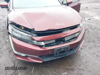 2018 Honda Clarity z VIN JHMZC5F12JC021958, wystawiony jako IAAI lot #42191071 z przebiegiem 29 423 mil mil oraz . Historia ofert i sprzedaży dostępna na DreamBid. Obrazek 6.