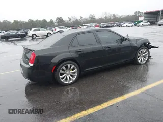 2015 Chrysler 300 C with VIN 2C3CCAEG8FH786879, listed as a IAAI auction lot 41563321 with 130,060 mi miles and . Bid and sale history available at carsss.com. Image 4.