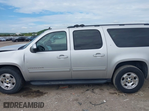 2011 Chevrolet Suburban LT with VIN 1GNSCJE05BR294452, listed as a IAAI auction lot 42107580 with 165,313 mi miles and . Bid and sale history available at DreamBid. Image 15.