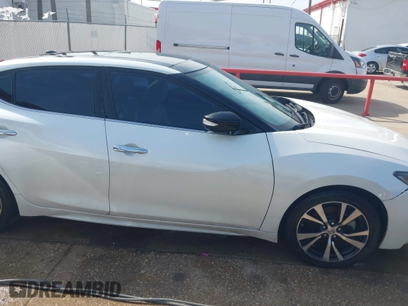 2016 Nissan Maxima SL with VIN 1N4AA6AP5GC383075, listed as a IAAI auction lot 41415505 with 164,392 mi miles and . Bid and sale history available at DreamBid. Image 13.