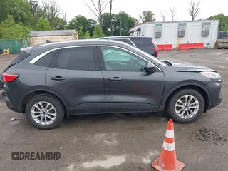 2020 Ford Escape SE with VIN 1FMCU9G64LUA25167, listed as a IAAI auction lot 42307557 with 82,524 mi miles and . Bid and sale history available at DreamBid. Image 14.