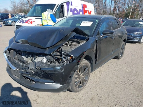 2022 Mazda CX-30 2.5 Turbo Premium Package with VIN 3MVDMBDY0NM459310, listed as a IAAI auction lot 41614937 with 32,514 mi miles. Bid and sale history available at carsss.com. Image 2.
