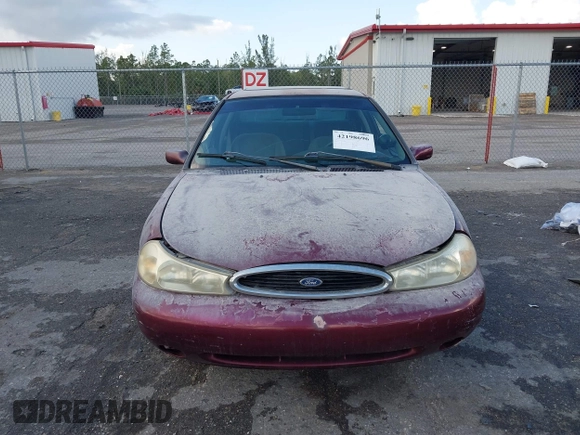 1999 Ford Contour SE z VIN 1FAFP6635XK169090, wystawiony jako IAAI lot #42198696 z przebiegiem 114 933 mil mil oraz . Historia ofert i sprzedaży dostępna na DreamBid. Obrazek 12.