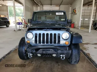 2007 Jeep Wrangler Unlimited Sahara с VIN 1J8GA591X7L217299, выставлен на аукционе Copart как лот 61984395 с пробегом 151 171 миль миль и Списание • Salvage title. История ставок и продаж доступна на DreamBid. Изображение 5.