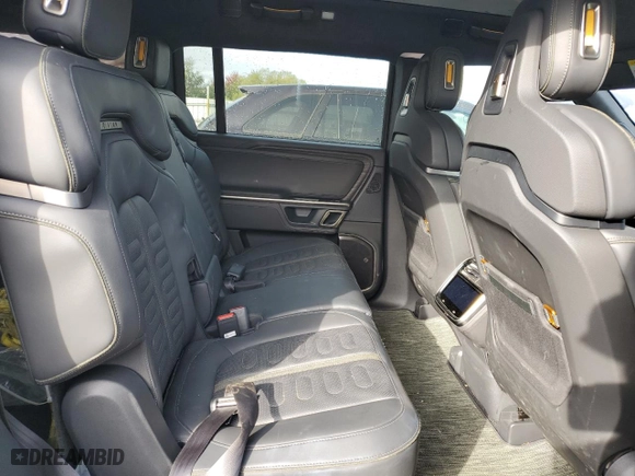 2023 Rivian R1S Adventure with VIN 7PDSGABAXPN019516, listed as a Copart auction lot 73248104 with 11,525 mi miles and Salvage Title. Bid and sale history available at carsss.com. Image 11.