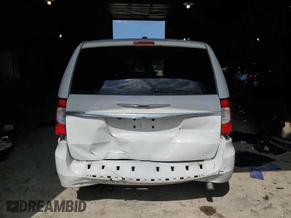 2016 Chrysler Town & Country Touring L Anniversary Edition with VIN 2C4RC1CG3GR284592, listed as a Copart auction lot 62499194 with 98,428 mi miles and Salvage Title. Bid and sale history available at DreamBid. Image 6.