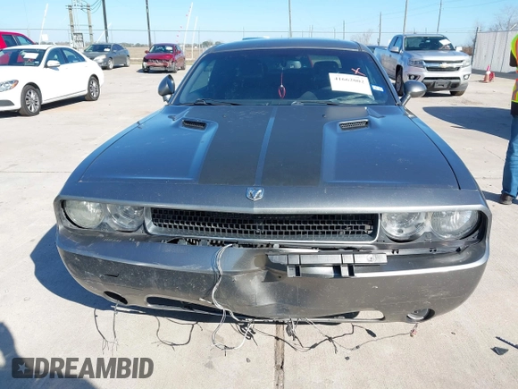 2012 Dodge Challenger SXT Plus with VIN 2C3CDYAG1CH262352, listed as a IAAI auction lot 41662002 with 141,868 mi miles. Bid and sale history available at carsss.com. Image 6.