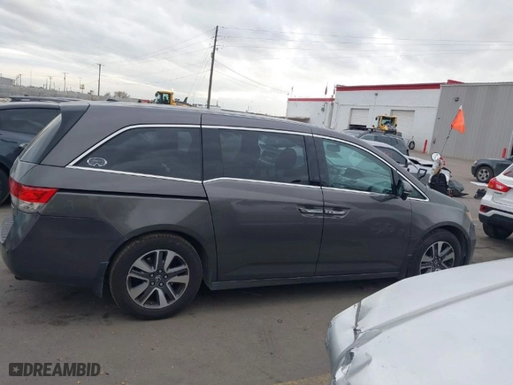 2015 Honda Odyssey Touring Elite with VIN 5FNRL5H94FB031342, listed as a IAAI auction lot 41112966 with NaN miles. Bid and sale history available at carsss.com. Image 13.