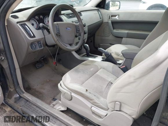 2008 Ford Focus SE with VIN 1FAHP33N38W107114, listed as a IAAI auction lot 42076432 with 124,487 mi miles. Bid and sale history available at carsss.com. Image 5.