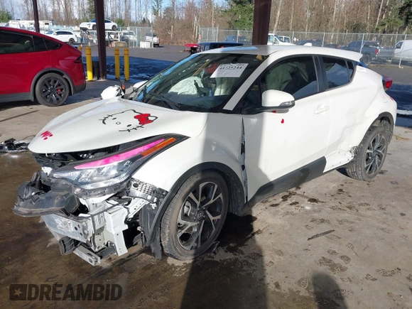 2021 Toyota C-HR LE with VIN NMTKHMBX2MR124470, listed as a IAAI auction lot 41725244 with Not Provided miles. Bid and sale history available at carsss.com. Image 2.