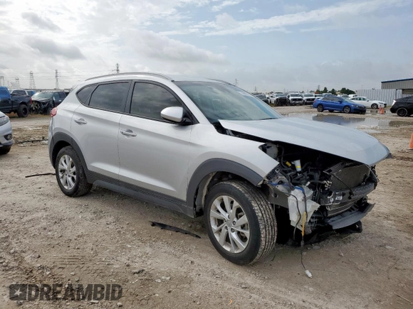 2019 Hyundai Tucson Value with VIN KM8J33A48KU962441, listed as a Copart auction lot 64451705 with 60,195 mi miles and Salvage title. Bid and sale history available at DreamBid. Image 4.