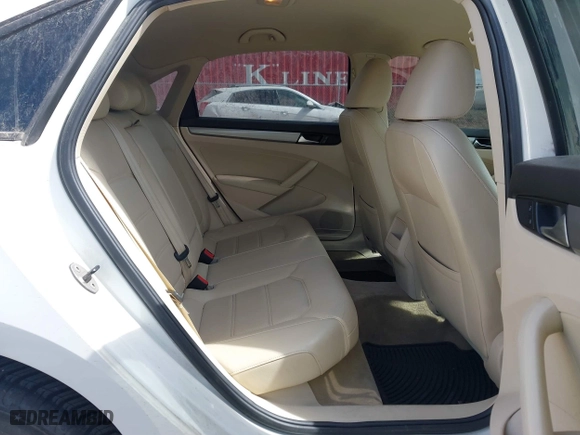 2014 Volkswagen Passat Wolfsburg Ed with VIN 1VWAT7A32EC099677, listed as a IAAI auction lot 41872416 with 182,392 mi miles. Bid and sale history available at carsss.com. Image 8.