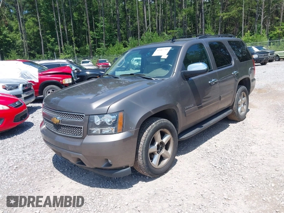 2012 Chevrolet Tahoe LT with VIN 1GNSCBE09CR229417, listed as a IAAI auction lot 42507793 with 164,877 mi miles and . Bid and sale history available at DreamBid. Image 2.