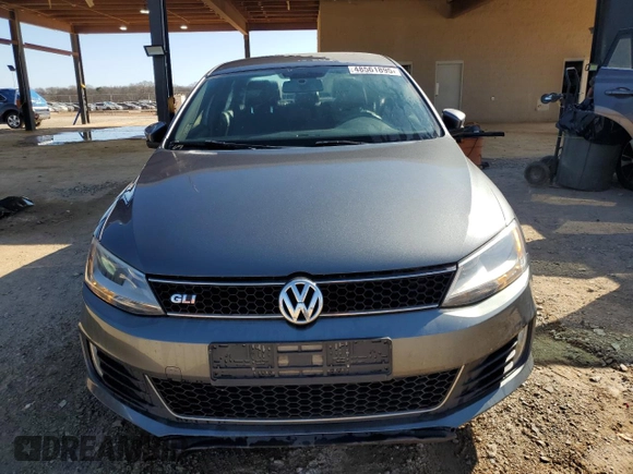 2013 Volkswagen Jetta GLI Autobahn z VIN 3VW4A7AJ0DM221810, wystawiony jako Copart lot #48561895 z przebiegiem 132 921 mil mil oraz Szkoda całkowita • Salvage title. Historia ofert i sprzedaży dostępna na DreamBid. Obrazek 5.