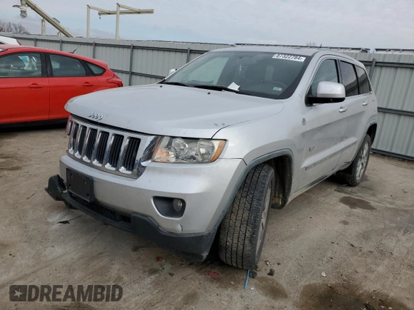 2011 Jeep Grand Cherokee 70th Anniversary with VIN 1J4RR4GT0BC666579, listed as a Copart auction lot 87322784 with 163,439 mi miles and Salvage Title. Bid and sale history available at carsss.com. Image 1.