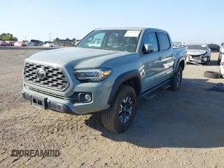 2022 Toyota Tacoma SR with VIN 3TMCZ5AN7NM501028, listed as a IAAI auction lot 42537868 with 42,186 mi miles and . Bid and sale history available at DreamBid. Image 17.