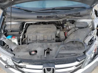2016 Honda Odyssey EX-L with VIN 5FNRL5H60GB070789, listed as a IAAI auction lot 42148249 with 64,691 mi miles. Bid and sale history available at carsss.com. Image 10.