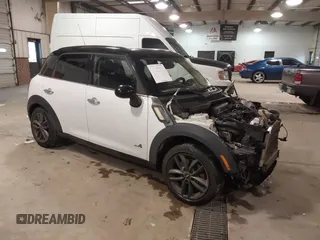 2013 MINI Countryman S ALL4 with VIN WMWZC5C56DWM15231, listed as a IAAI auction lot 41249376 with 134,305 mi miles and . Bid and sale history available at DreamBid. Image 1.