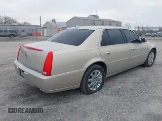 2009 Cadillac DTS w/1SA with VIN 1G6KD57Y29U137410, listed as a IAAI auction lot 42026044 with 112,916 mi miles. Bid and sale history available at carsss.com. Image 4.