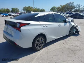 2022 Toyota Prius L Eco with VIN JTDKAMFU1N3177444, listed as a IAAI auction lot 41812402 with 44,666 mi miles. Bid and sale history available at carsss.com. Image 4.