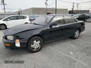 1995 Toyota Camry LE with VIN JT2GK12E2S0079545, listed as a Copart auction lot 84058164 with 150,539 mi miles and Salvage Title. Bid and sale history available at carsss.com. Image 1.