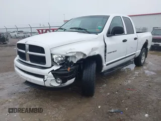2003 Dodge 1500 SLT z VIN 1D7HU18N93J621948, wystawiony jako IAAI lot #41448520 z przebiegiem 200 091 mil mil oraz . Historia ofert i sprzedaży dostępna na DreamBid. Obrazek 18.