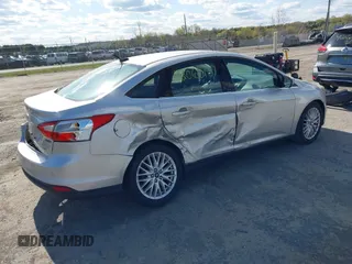 2012 Ford Focus SEL with VIN 1FAHP3H29CL151658, listed as a IAAI auction lot 42060139 with 149,547 mi miles and . Bid and sale history available at carsss.com. Image 4.