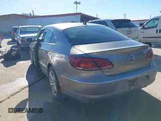 2014 Volkswagen CC Sport with VIN WVWBN7AN1EE518559, listed as a IAAI auction lot 41208853 with 154,957 mi miles. Bid and sale history available at carsss.com. Image 3.