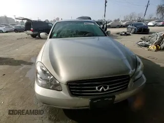 2003 Infiniti Q45 z VIN JNKBF01A03M101890, wystawiony jako Copart lot #86930994 z przebiegiem 158 134 mil mil oraz Szkody całkowita. Historia ofert i sprzedaży dostępna na DreamBid. Obrazek 10.