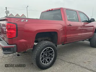 2018 Chevrolet Silverado 1500 LT with VIN 3GCUKREC0JG399301, listed as a Copart auction lot 53949965 with 164,299 mi miles and Clean Title. Bid and sale history available at carsss.com. Image 4.