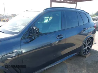 2022 BMW X5 xDrive45e with VIN 5UXTA6C07N9J29881, listed as a IAAI auction lot 42086373 with 63,510 mi miles and . Bid and sale history available at DreamBid. Image 14.