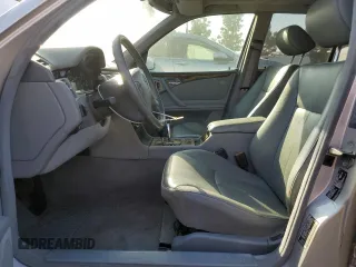 2002 Mercedes-Benz E-Class with VIN WDBJF65J32B496411, listed as a Copart auction lot 75690884 with 128,855 mi miles and Salvage Title. Bid and sale history available at carsss.com. Image 7.