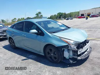 2016 Toyota Prius Four z VIN JTDKARFU0G3016597, wystawiony jako IAAI lot #42034214 z przebiegiem 125 799 mil mil oraz . Historia ofert i sprzedaży dostępna na DreamBid. Obrazek 1.