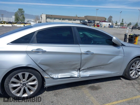 2013 Hyundai Sonata Limited with VIN 5NPEC4AC8DH668294, listed as a IAAI auction lot 41884592 with 137,709 mi miles and . Bid and sale history available at DreamBid. Image 6.
