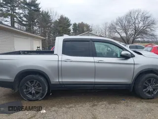 2020 Honda Ridgeline Sport with VIN 5FPYK3F13LB023123, listed as a IAAI auction lot 41694273 with 51,934 mi miles and . Bid and sale history available at DreamBid. Image 14.