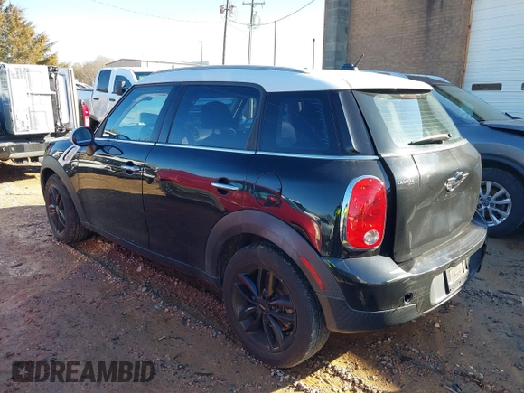 2015 MINI Countryman with VIN WMWZB3C59FWR44862, listed as a IAAI auction lot 41199254 with 94,074 mi miles and . Bid and sale history available at DreamBid. Image 3.