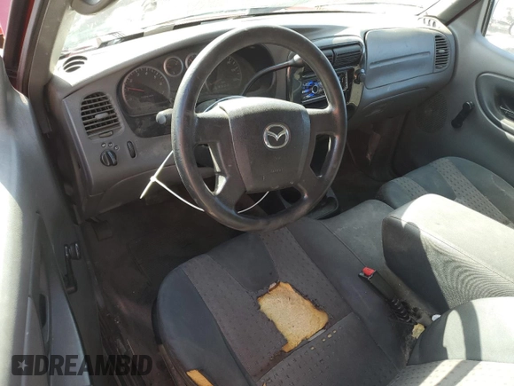 2004 Mazda B-Series Truck z VIN 4F4YR12D04TM00151, wystawiony jako Copart lot #54262875 z przebiegiem 189 201 mil mil oraz Szkoda całkowita • Salvage title. Historia ofert i sprzedaży dostępna na DreamBid. Obrazek 8.