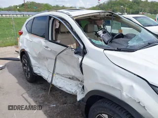 2018 Honda CR-V Touring with VIN 5J6RW2H99JL020598, listed as a IAAI auction lot 42104765 with 30,431 mi miles and . Bid and sale history available at carsss.com. Image 6.