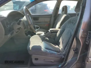 1999 Buick Regal LS with VIN 2G4WB52K4X1458845, listed as a Copart auction lot 55254814 with 200,000 mi miles and Salvage title. Bid and sale history available at DreamBid. Image 7.