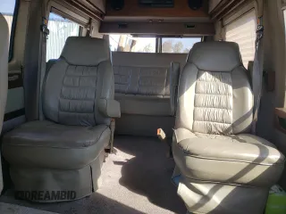 1995 Chevrolet Chevy Van z VIN 1GBEG25K9SF175004, wystawiony jako Copart lot #77952694 z przebiegiem 217 649 mil mil oraz Szkoda całkowita • Salvage title. Historia ofert i sprzedaży dostępna na DreamBid. Obrazek 10.