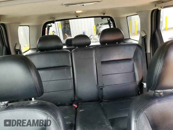2005 Ford Escape Limited with VIN 1FMYU94145KE17773, listed as a Copart auction lot 60451635 with 181,098 mi miles and Salvage title. Bid and sale history available at DreamBid. Image 10.